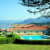 Swimming pool at Parador Baiona Bayona